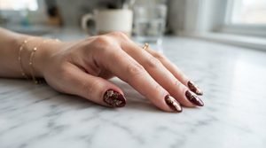 Hand_resting_on_marble_countertop_202608291120