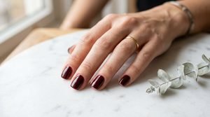 Woman_hand_on_marble_surface_202608252221